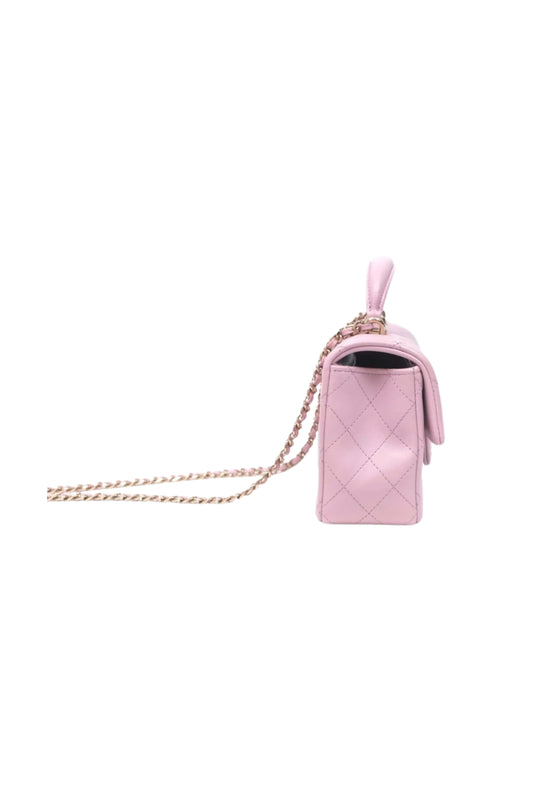 Chanel Top Handle Mini Rectangular Flap en Lambskin Lilac Pink con herrajes Gold.