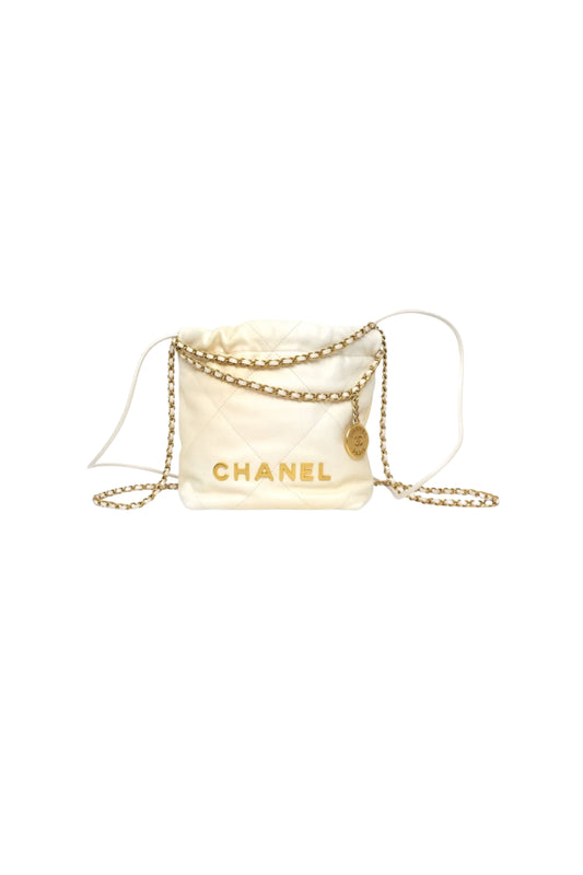 Chanel 22 Mini Bag en cuero Calfskin iridiscente Light Pearly con herrajes Aged Gold.