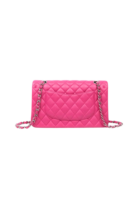 Chanel Classic M/L Medium Flap Quilted en Lambskin Hot Pink con herrajes Silver.