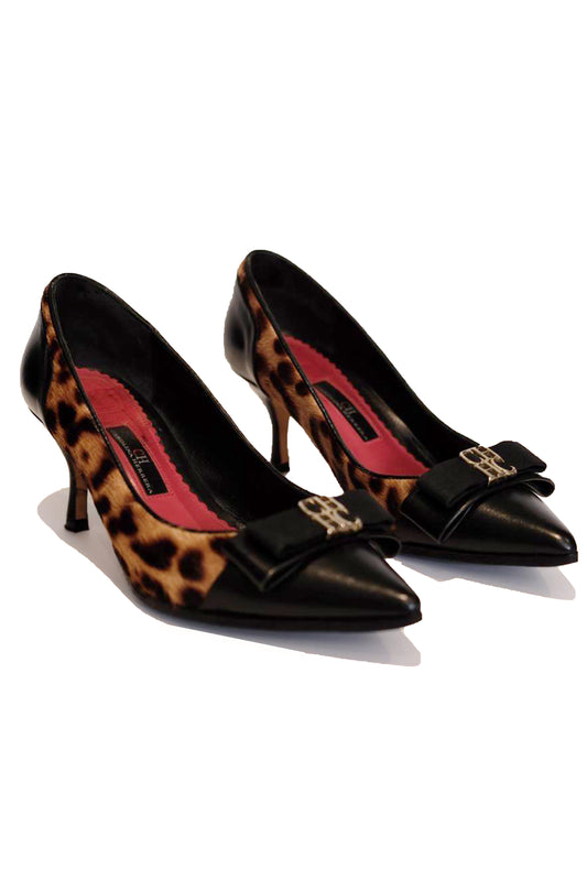 STILETTOS CAROLINA HERRERA LEOPARD PRINT PUMPS