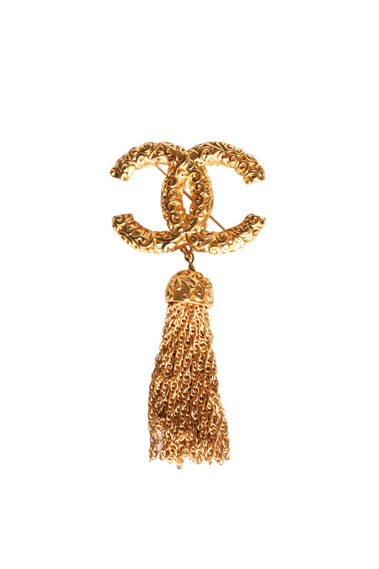 VINTAGE CHANEL BROCHE LAVA À FRANGES COCO MARK CON BORLA Y LOGO CC 1993 DORADO