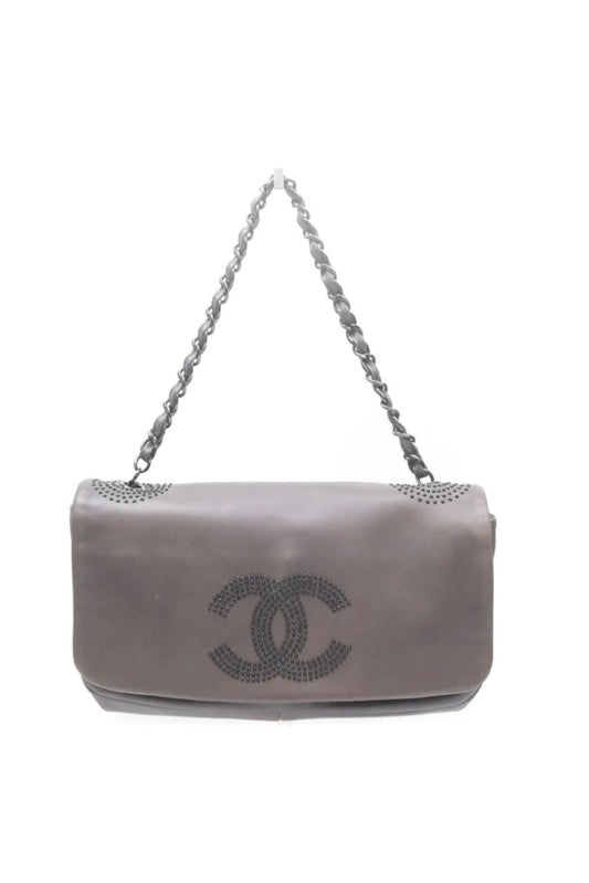CHANEL EAST WEST FLAP BAG WITH STUDDED CC LOGO